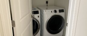 a washer and dryer in a closet