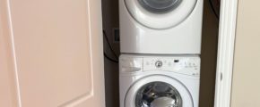 a stacked washer and dryer in a closet