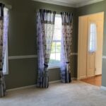 view of large windows in the den