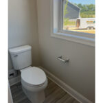 a toilet and a window