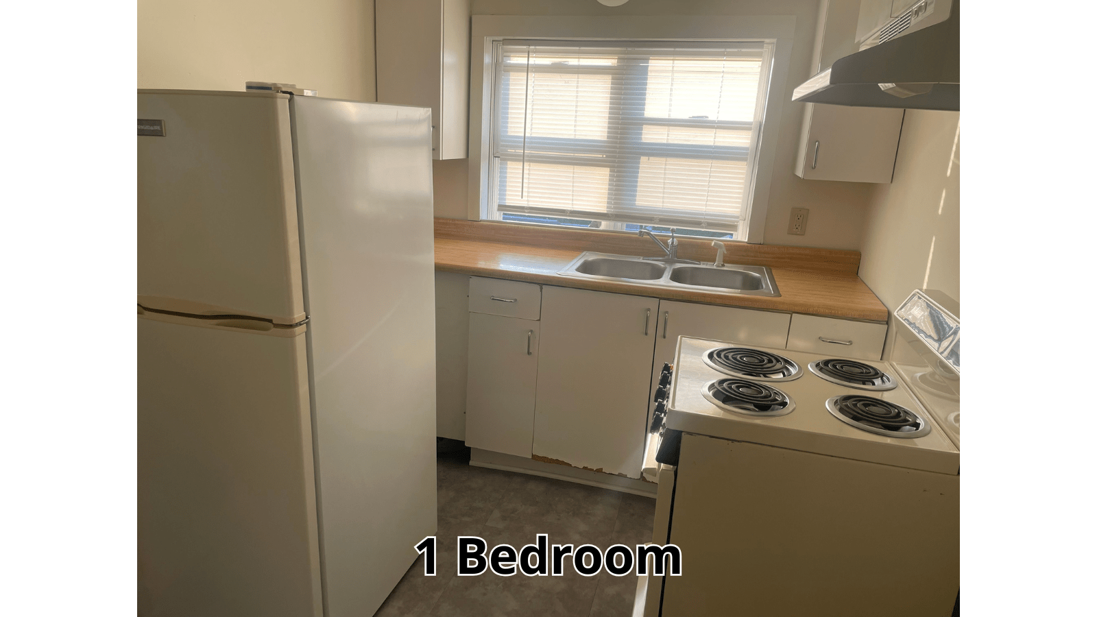 1 Bedroom kitchen with refrigerator and stove