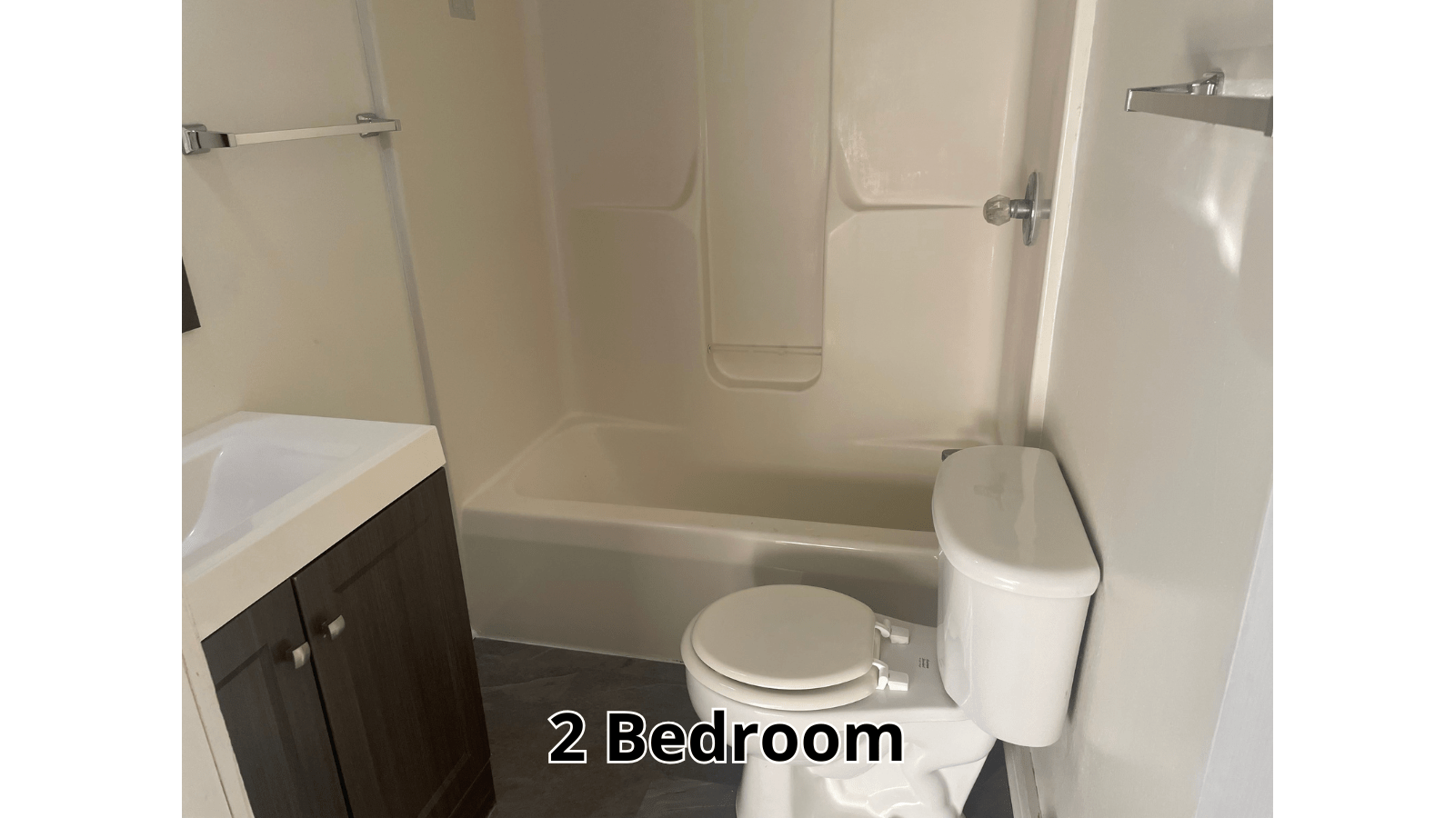 2 Bedroom bathroom with tub and toilet