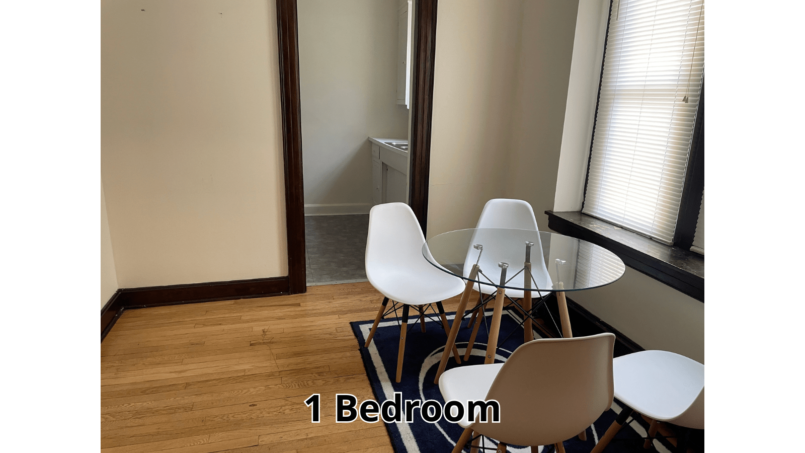 Dining area with glass table and chairs
