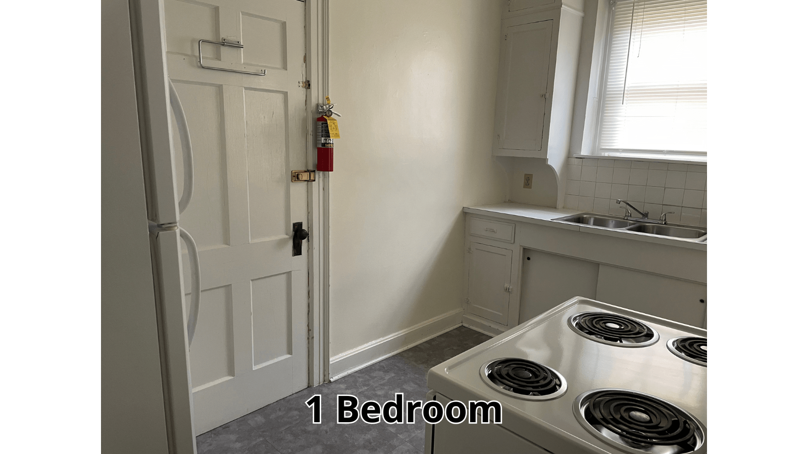 1 Bedroom kitchen with stove and sink