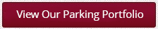 a red sign that says view our parking portal