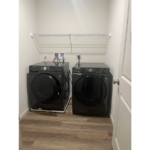 a washer and dryer in a small room