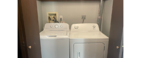 a washer and dryer in a laundry closet