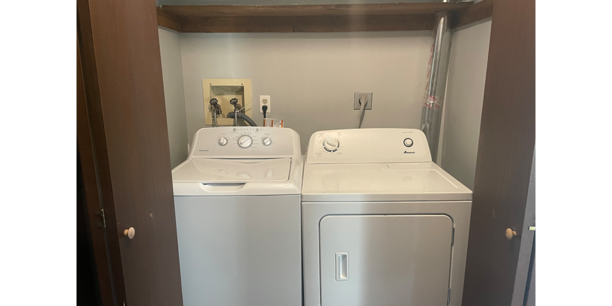 a washer and dryer in a laundry closet