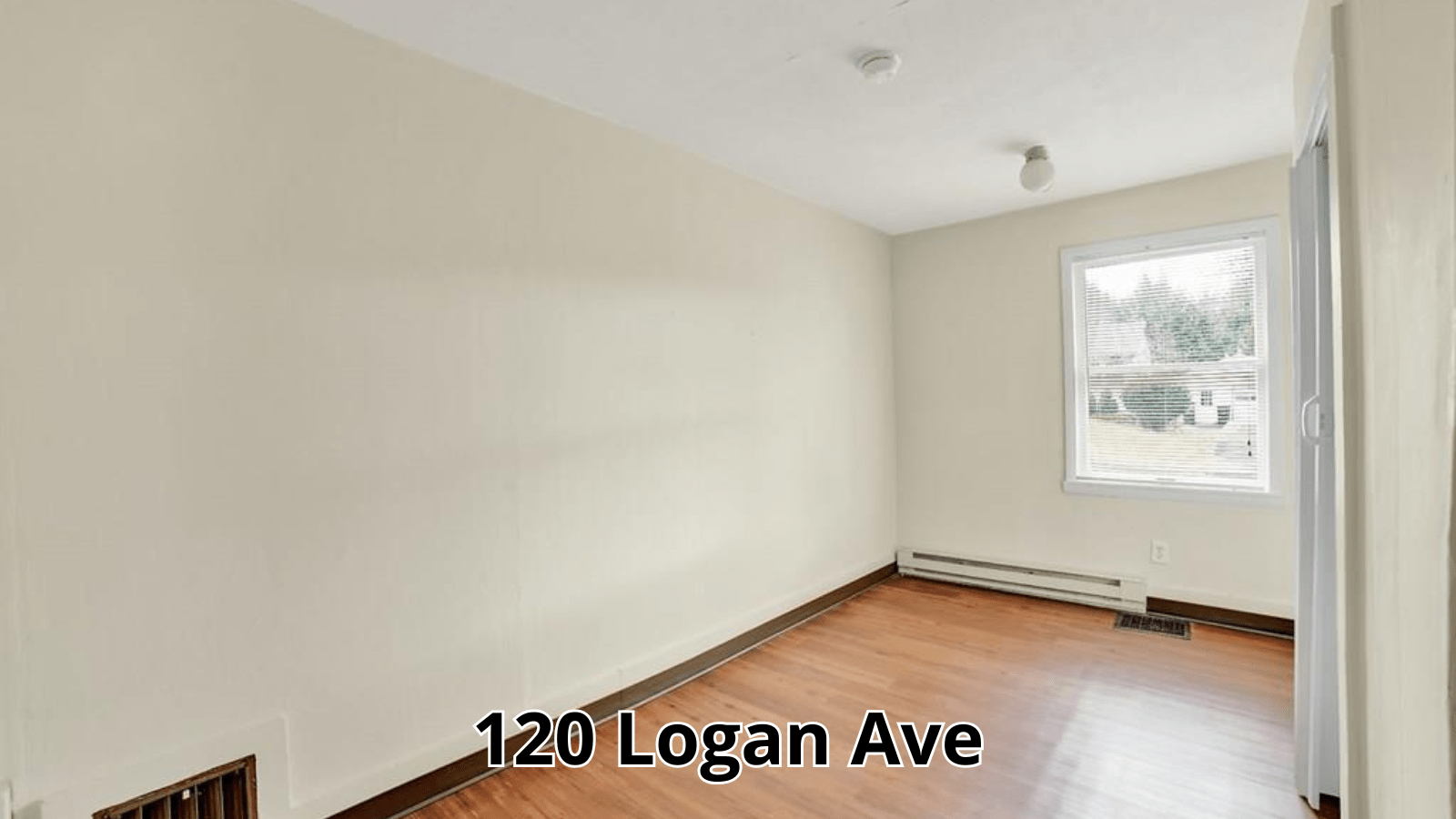 Interior of 120 Logan Ave with window and door
