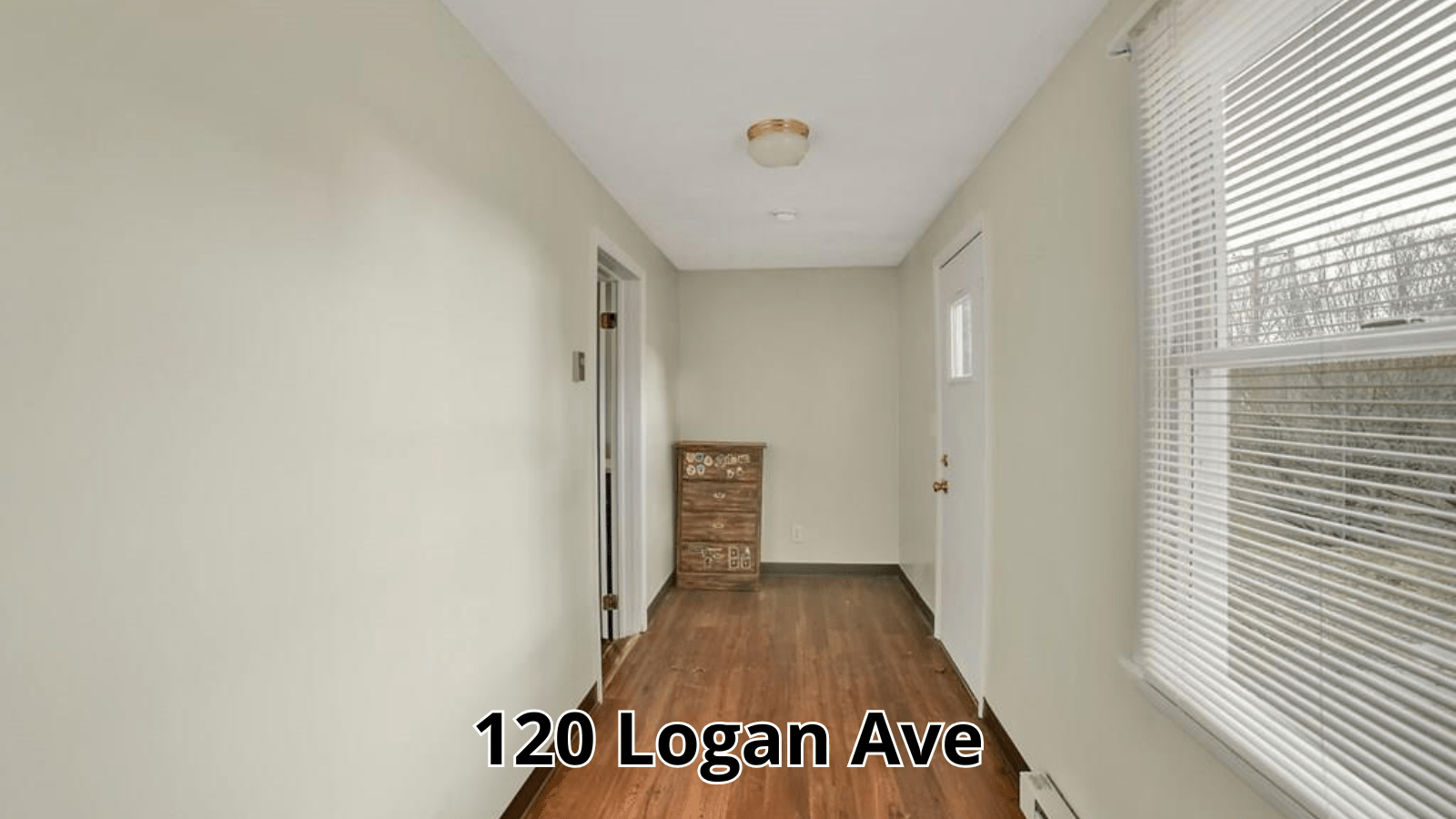 Hallway at 120 Logan Ave with wood floors