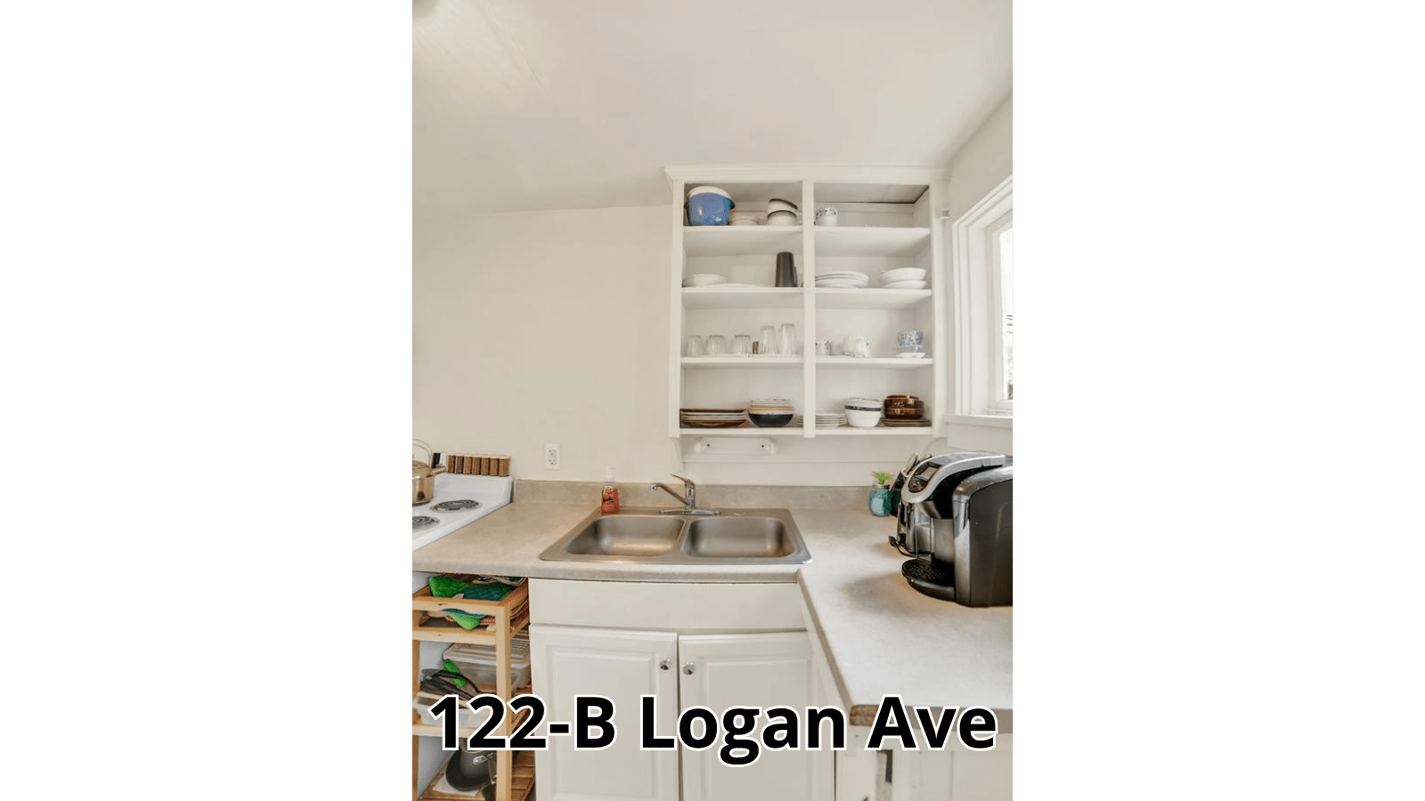 Kitchen sink and shelves at 122 Logan Ave