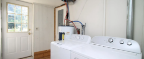 a washer and dryer in a small room