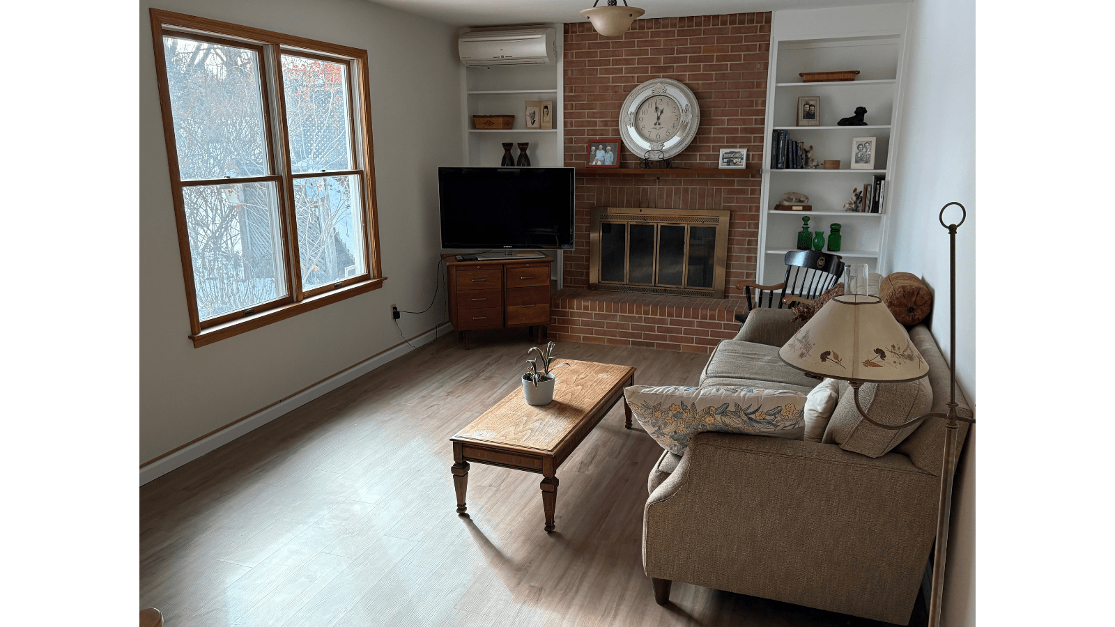 Living room with fireplace and sofa