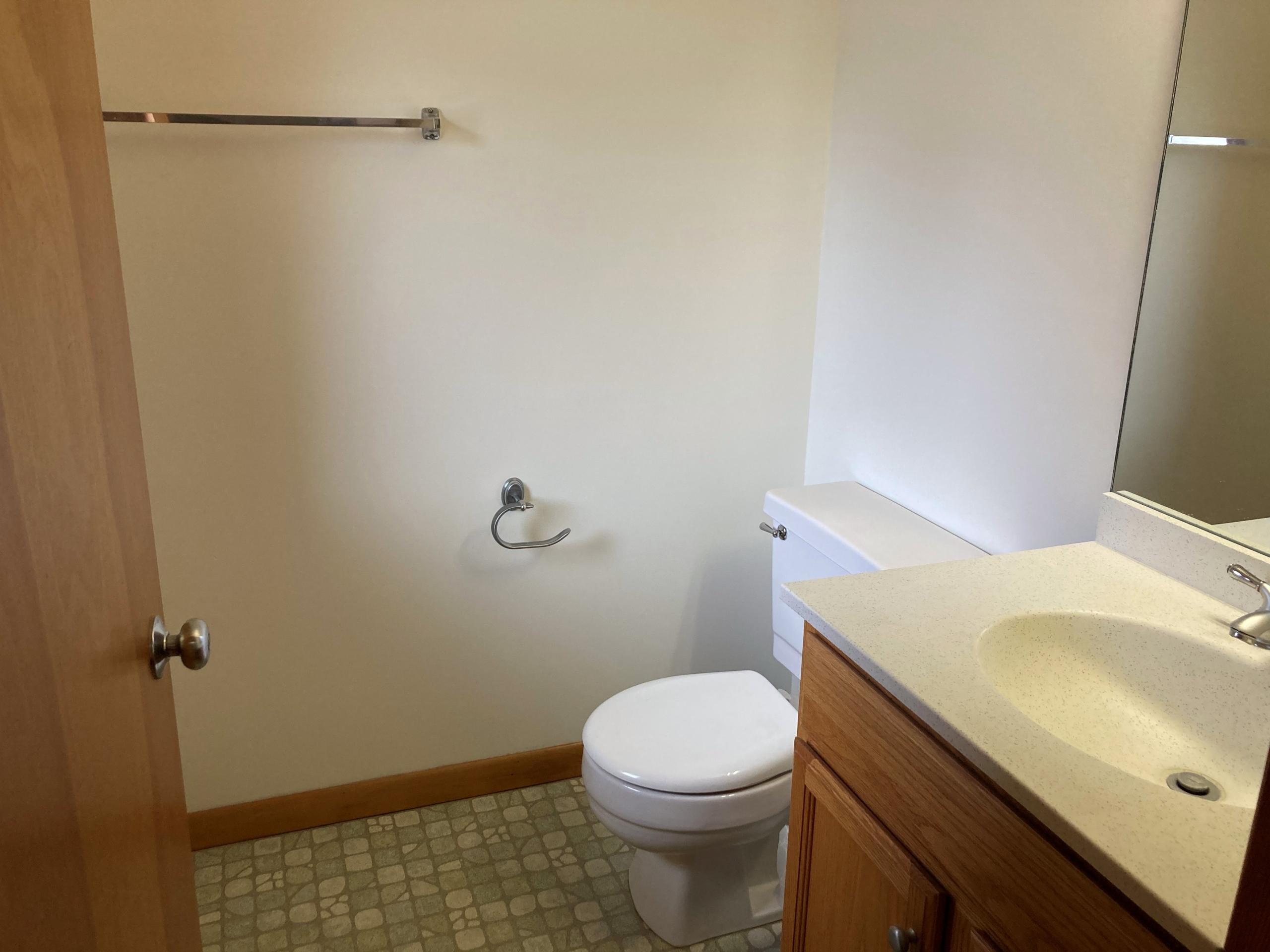 Small bathroom with toilet and sink