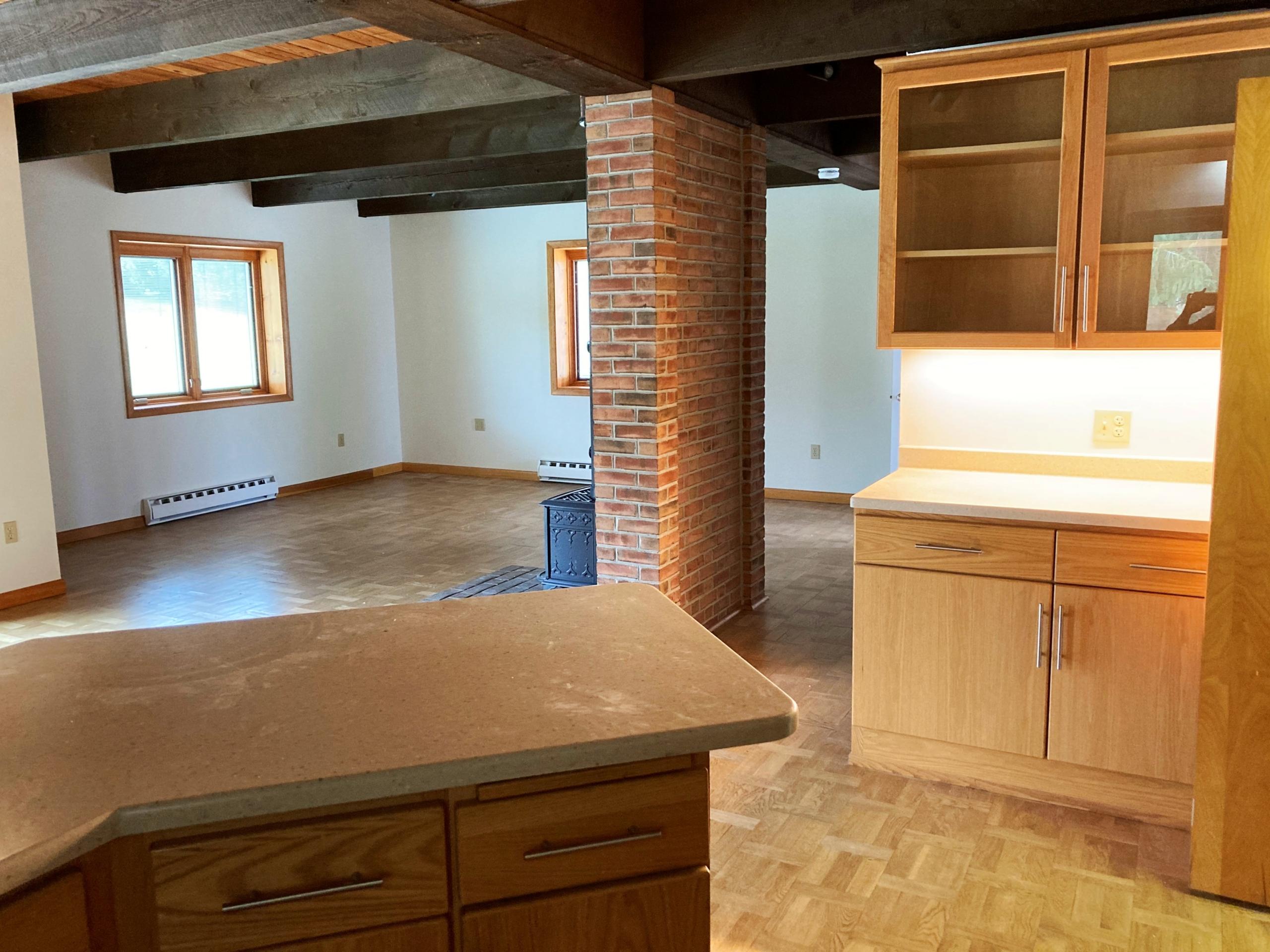Kitchen island and cabinets in room