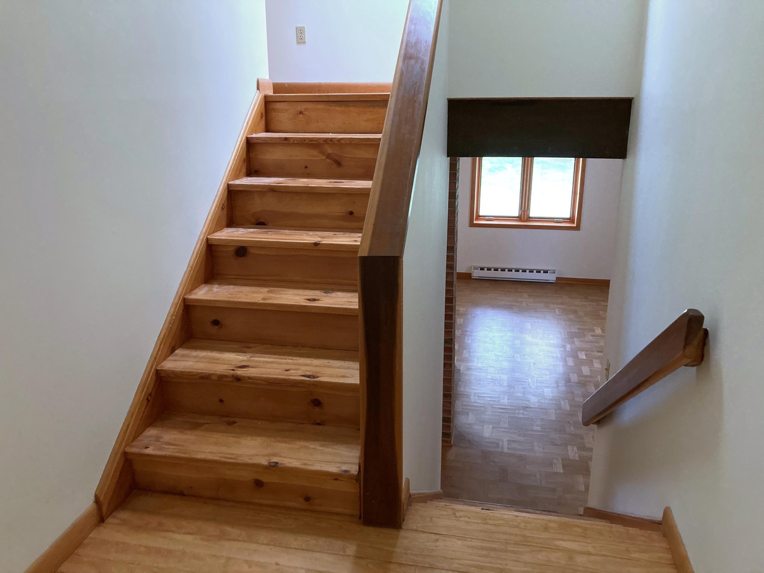 Wooden staircase leading to upper floor