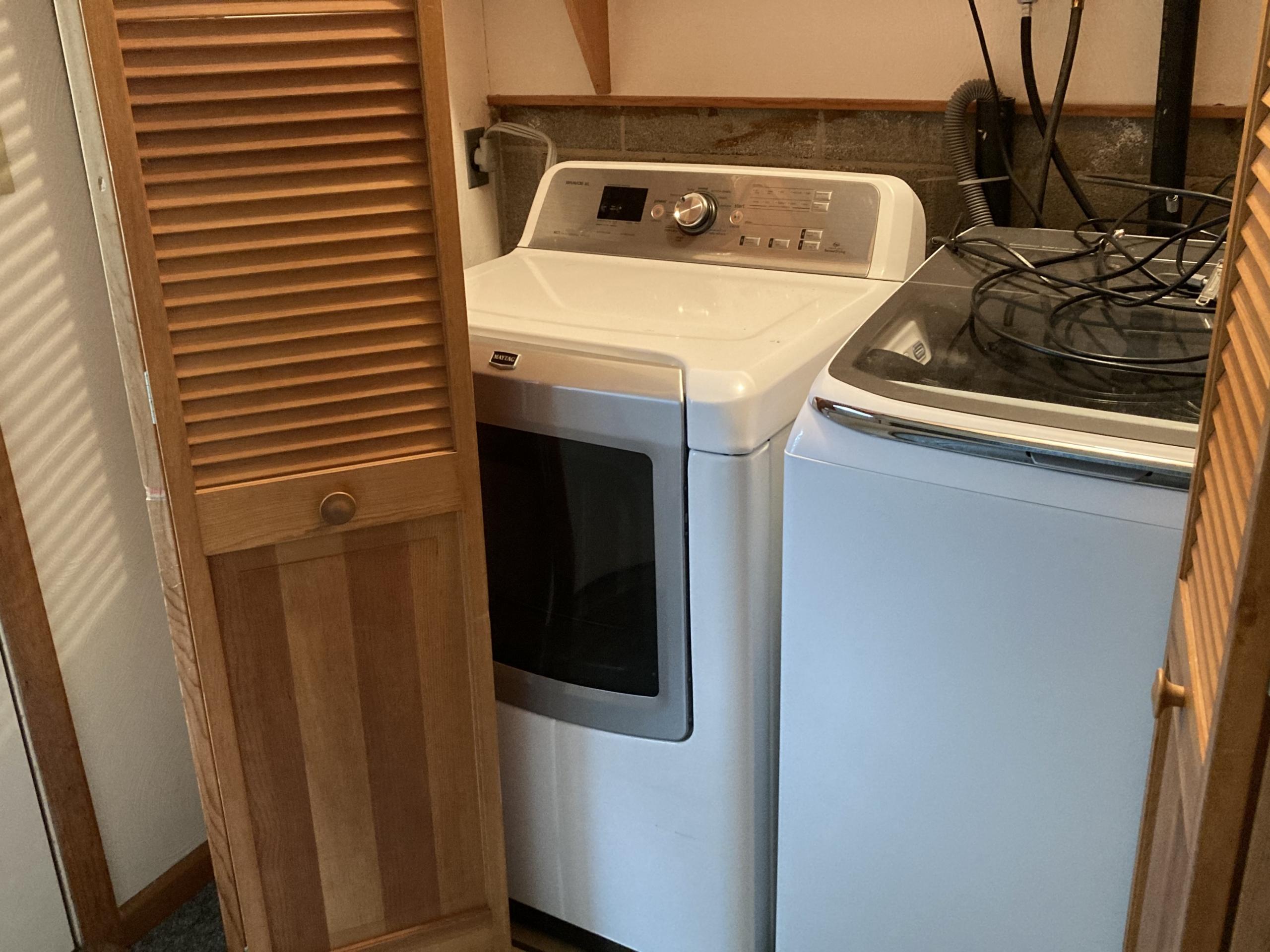 Laundry room with washer and dryer