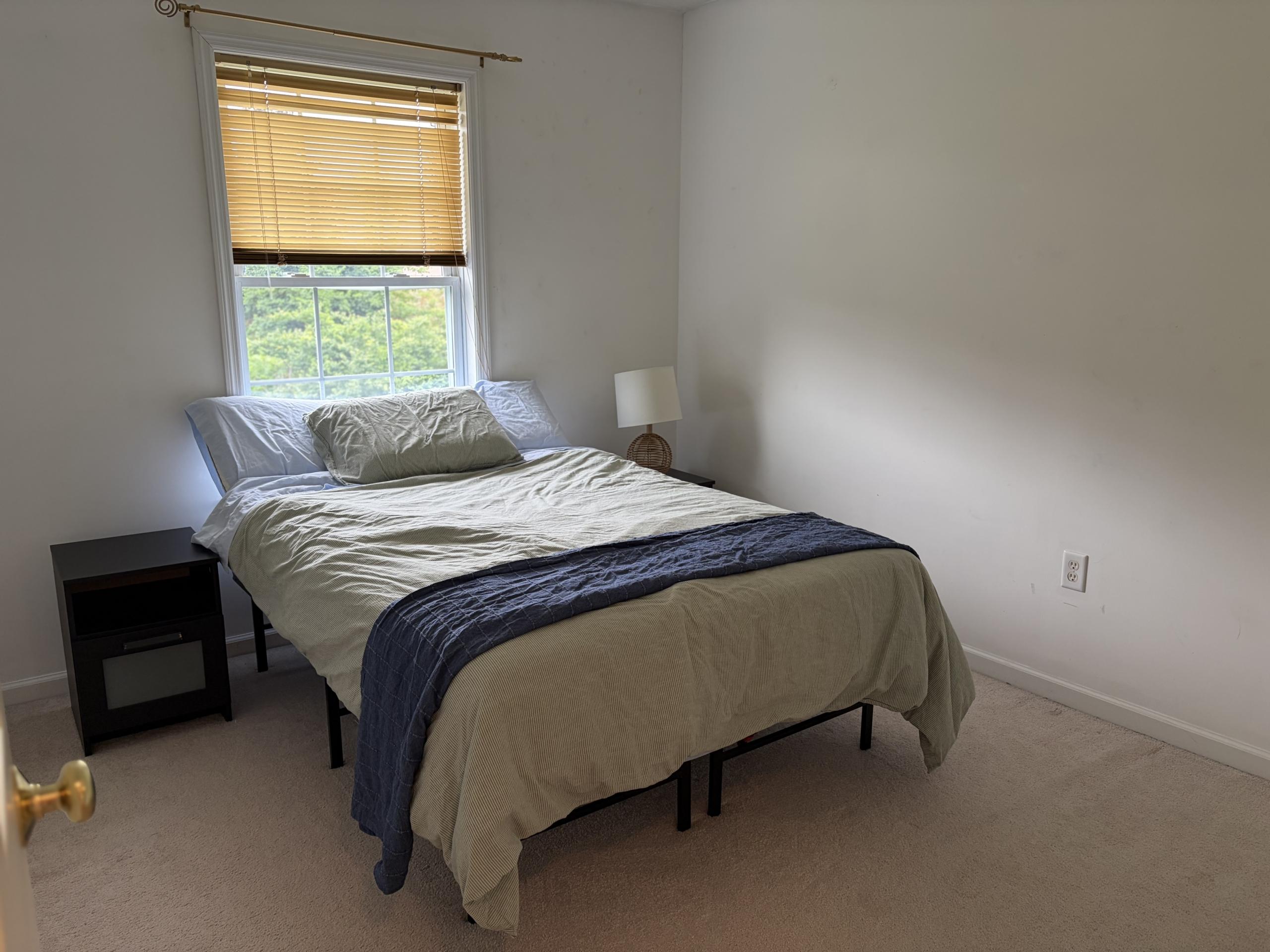 Bedroom with a bed and window