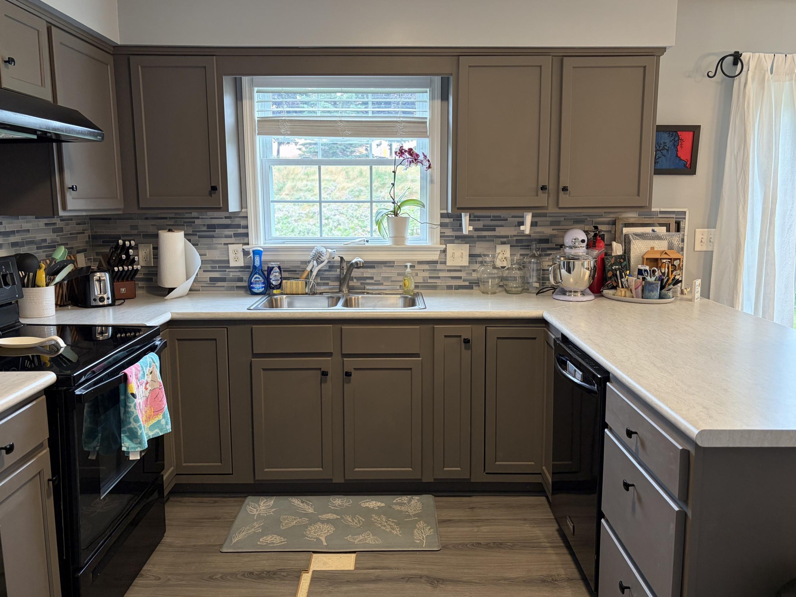 Modern gray kitchen with stainless steel sink