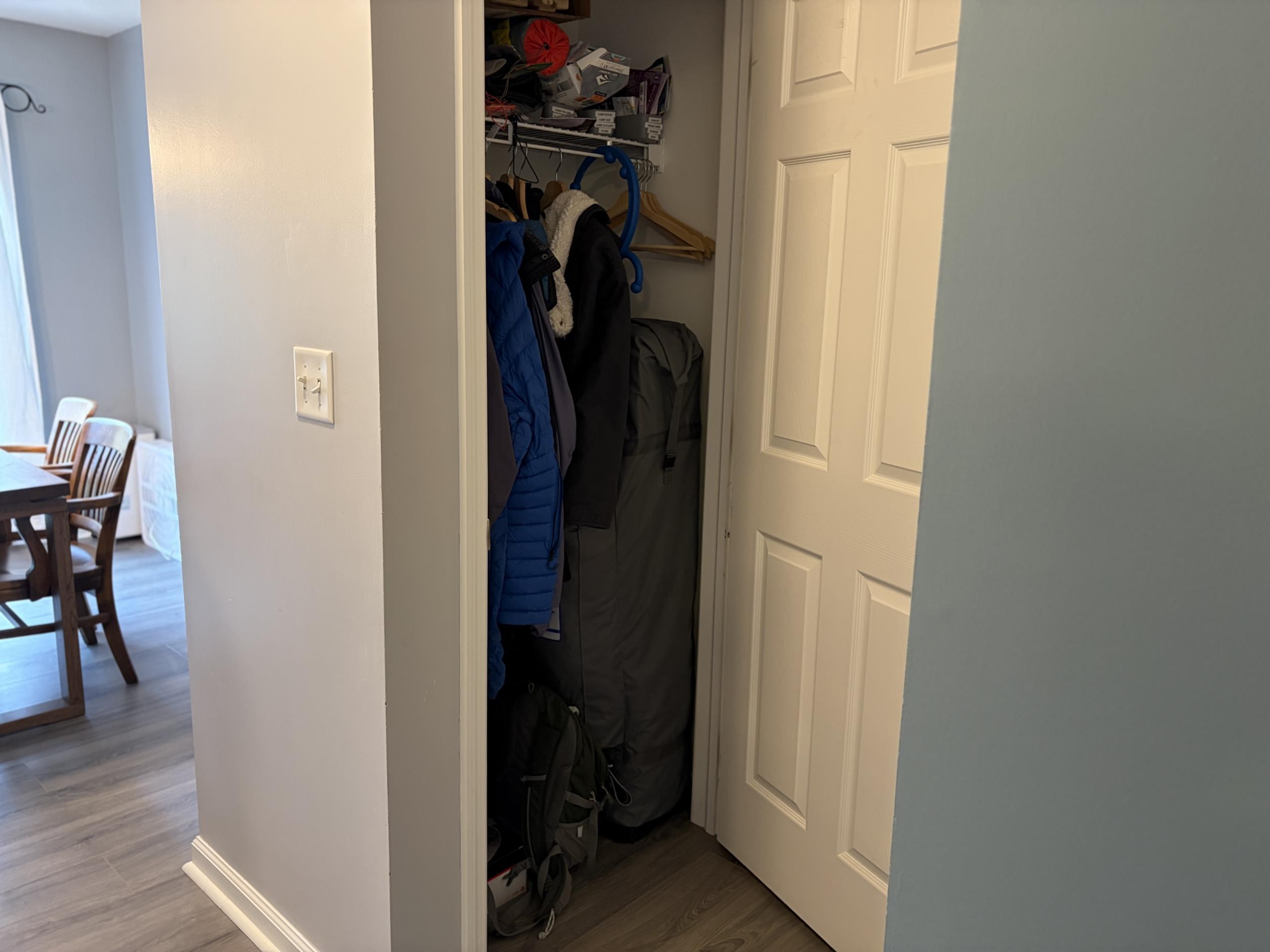 Closet with coats and bags