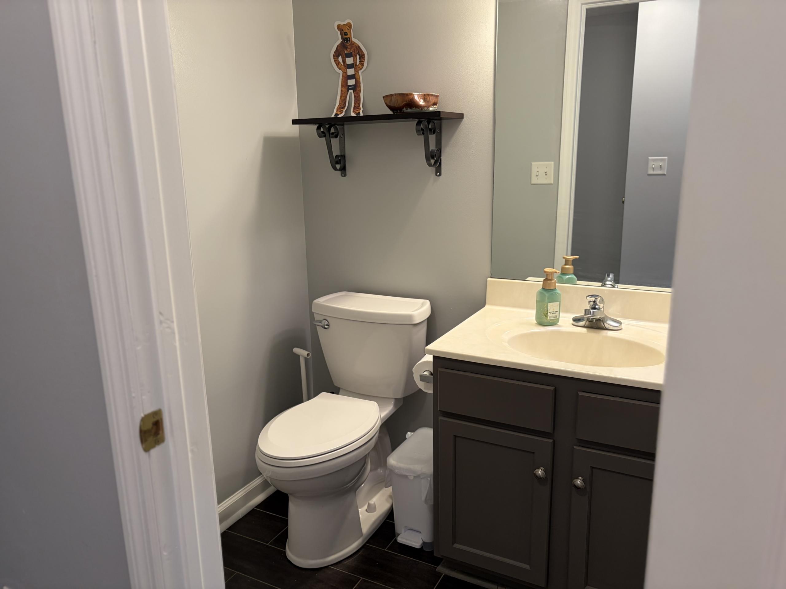 Small bathroom with toilet and vanity