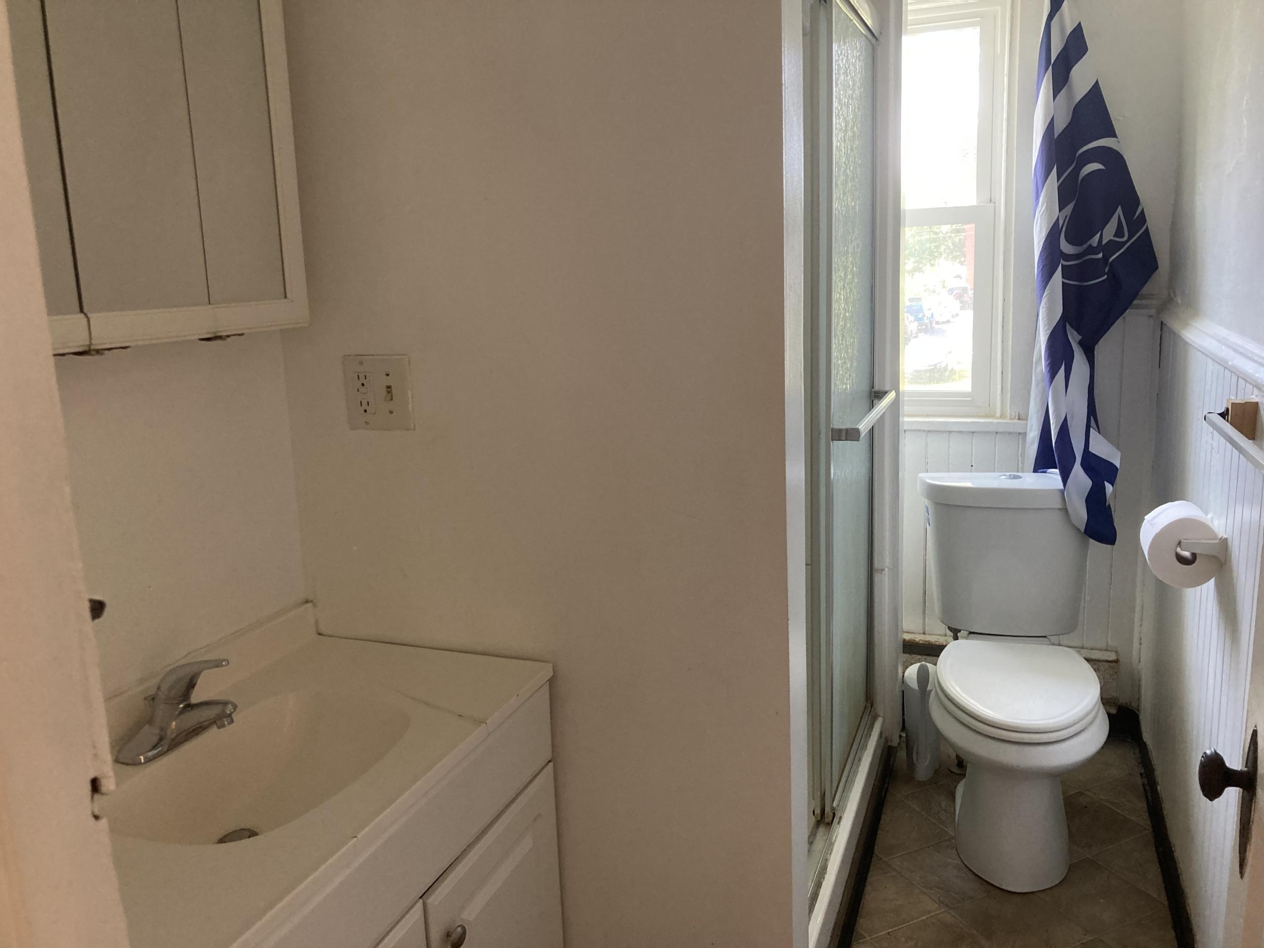 Small bathroom with sink and toilet