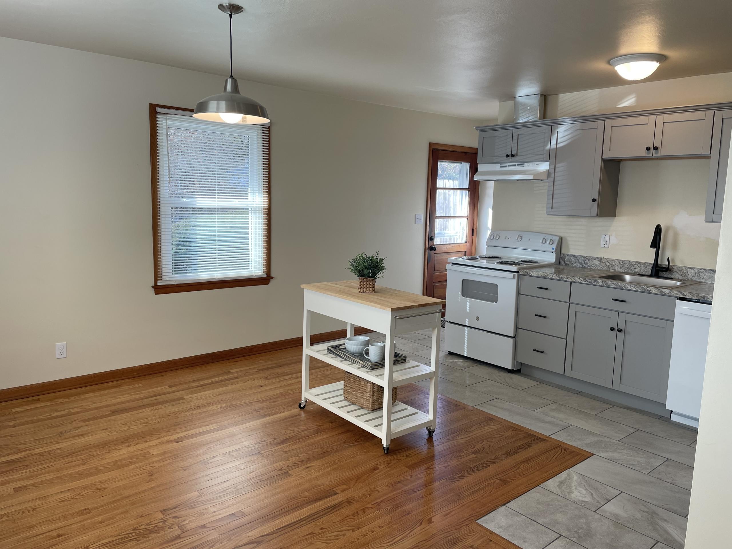 Kitchen and dining area with island