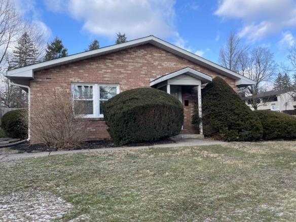 Brick house at 641 E. Waring Avenue