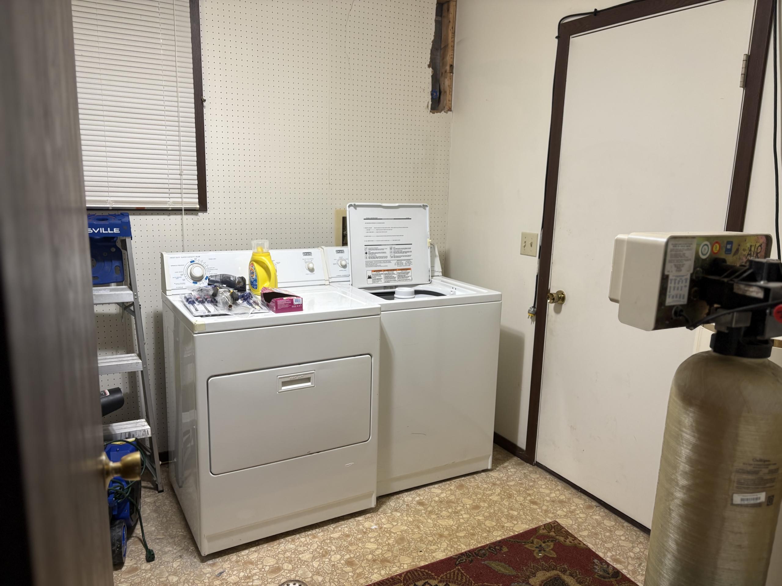 Laundry room with washer and dryer
