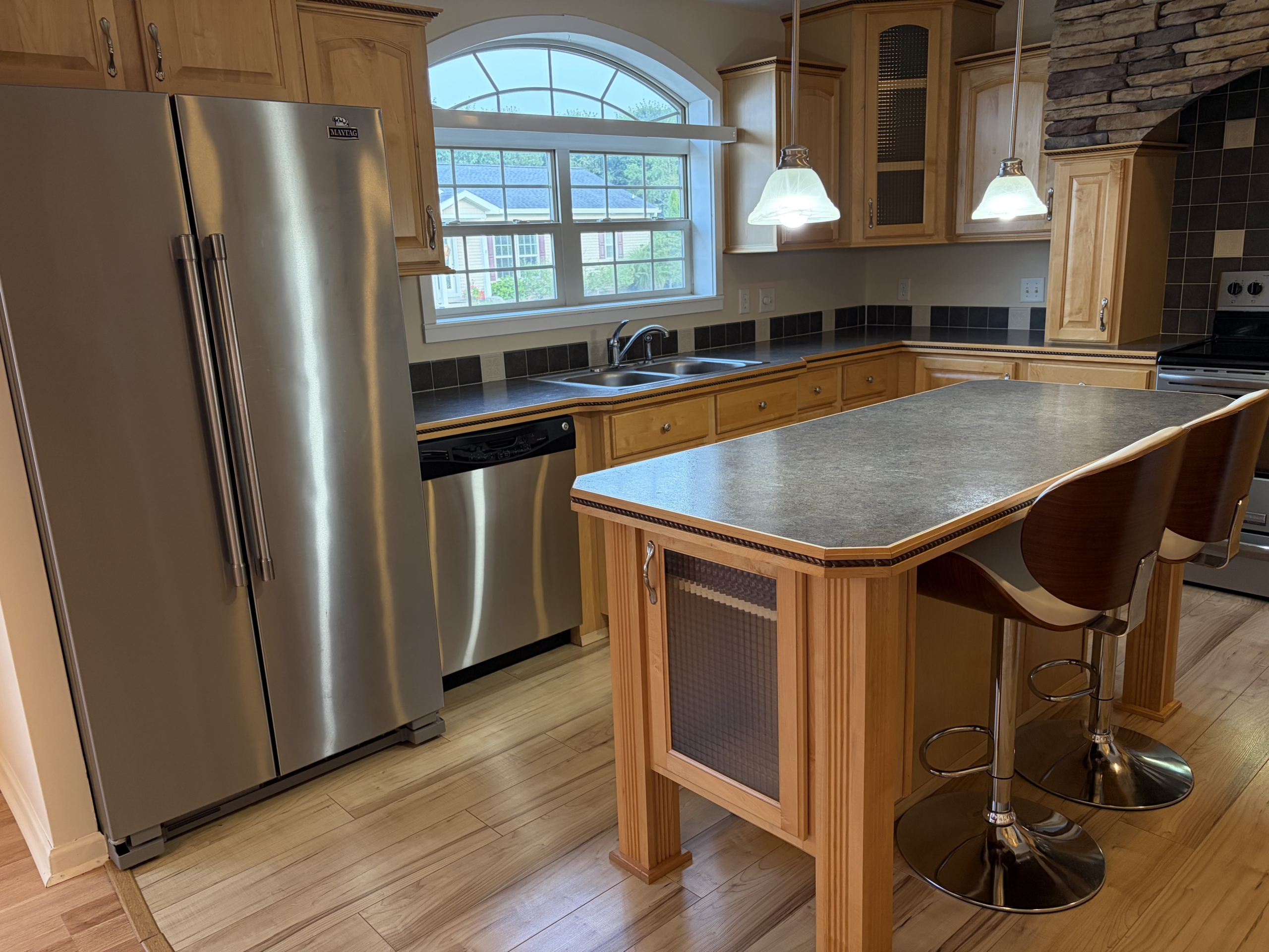 Kitchen island with bar stools