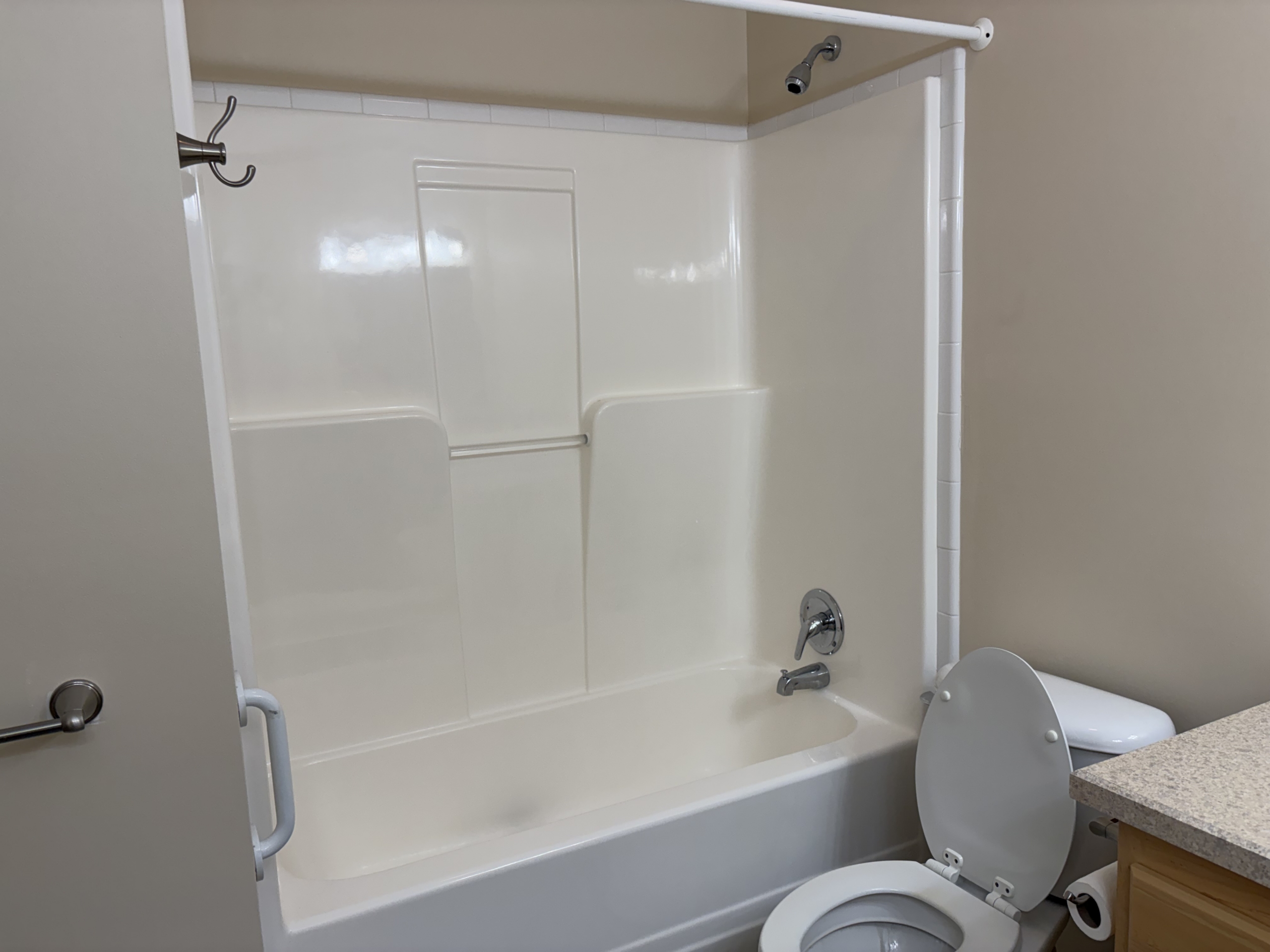 Bathroom with bathtub and toilet