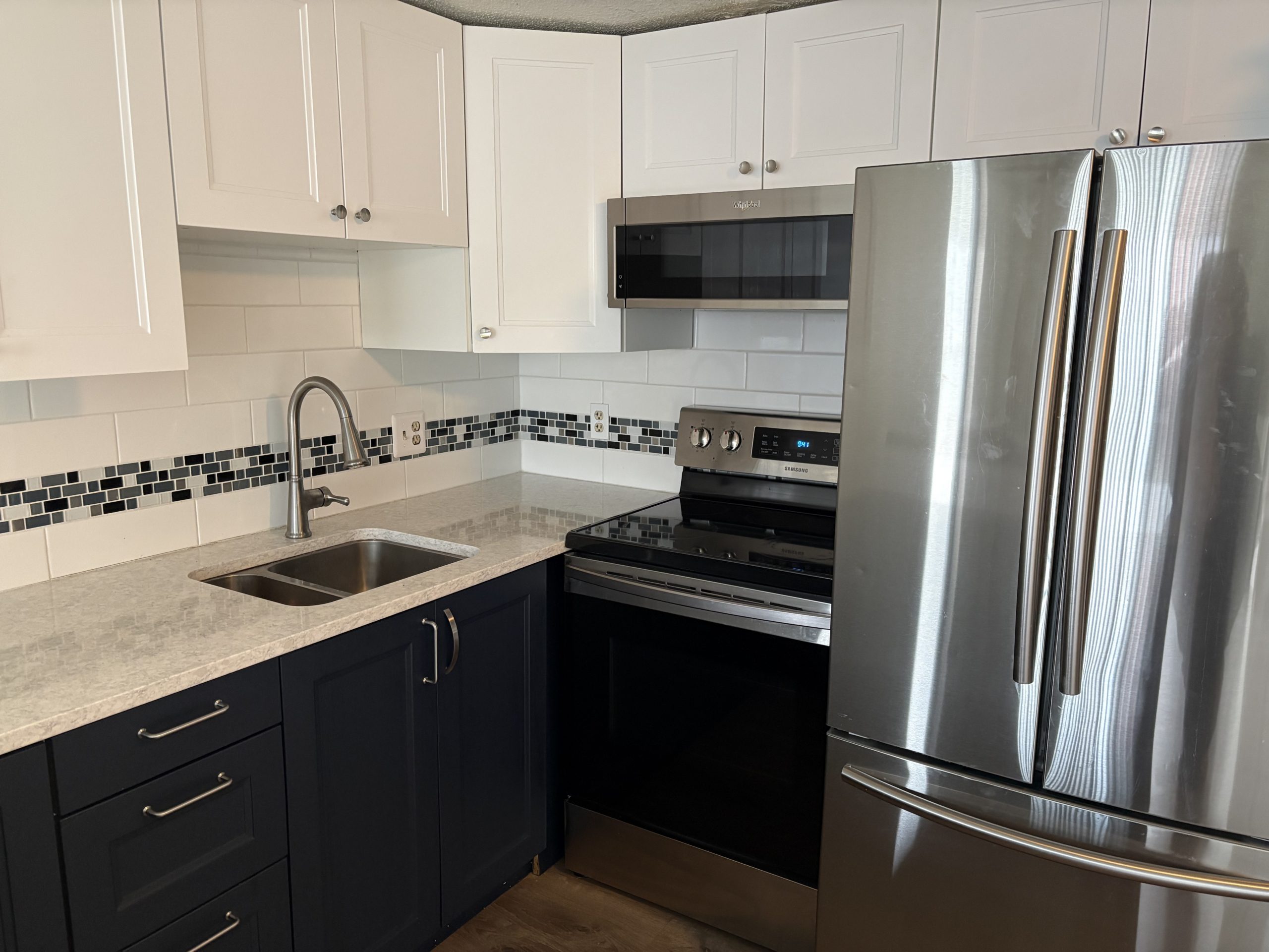 Modern kitchen with stainless steel appliances
