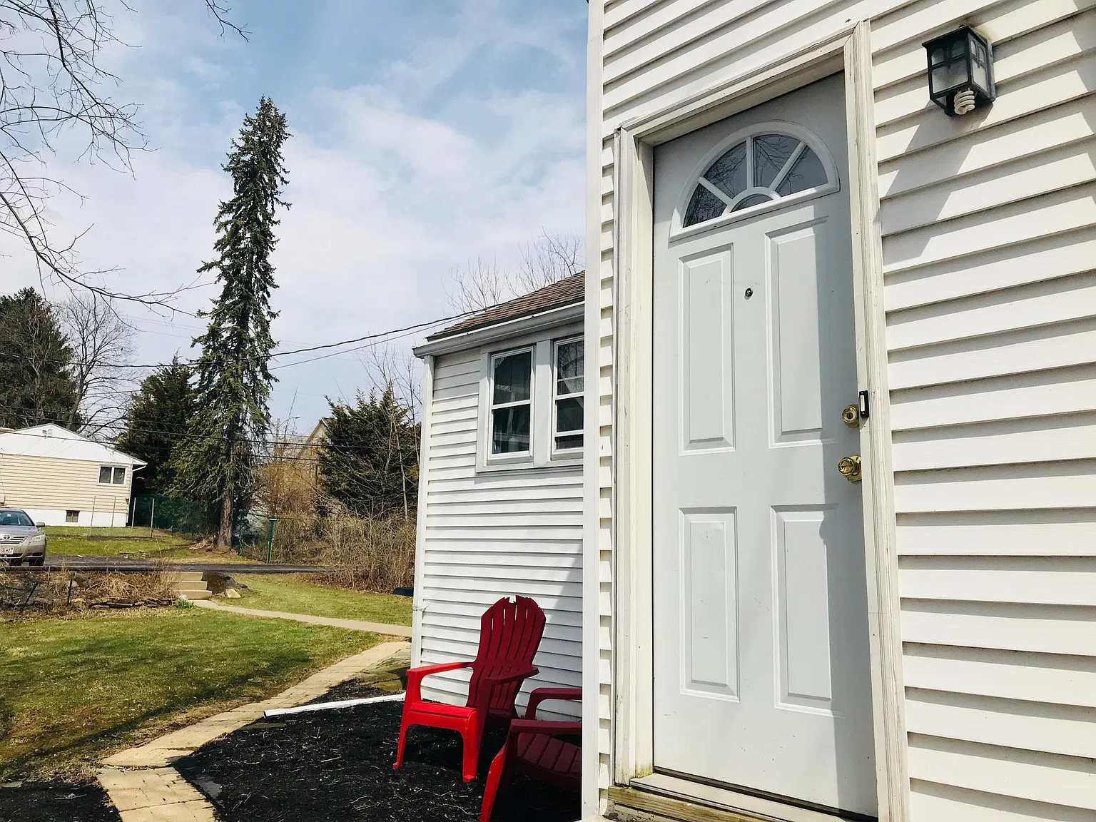 White door with arched window